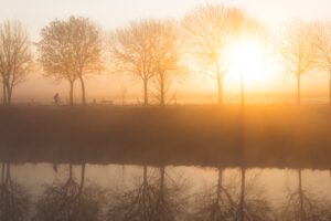 Zonsopkomst langs de Leie te Menen